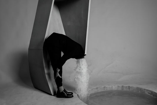 Fountain of Youth by Erin Naifeh - surreal black and white photography about aging with waterfall erupting from figure's neck